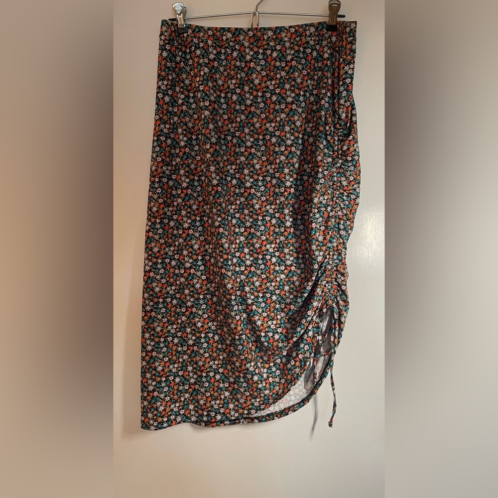 Asymmetrical side tie skirt